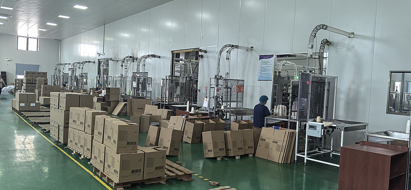 EcoWing production floor with stacked cartons