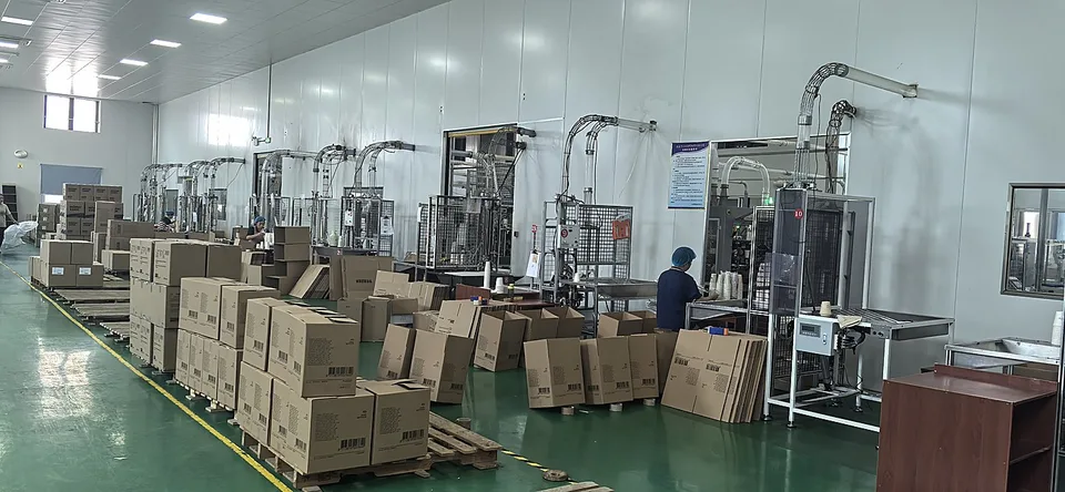 EcoWing production floor with stacked cartons