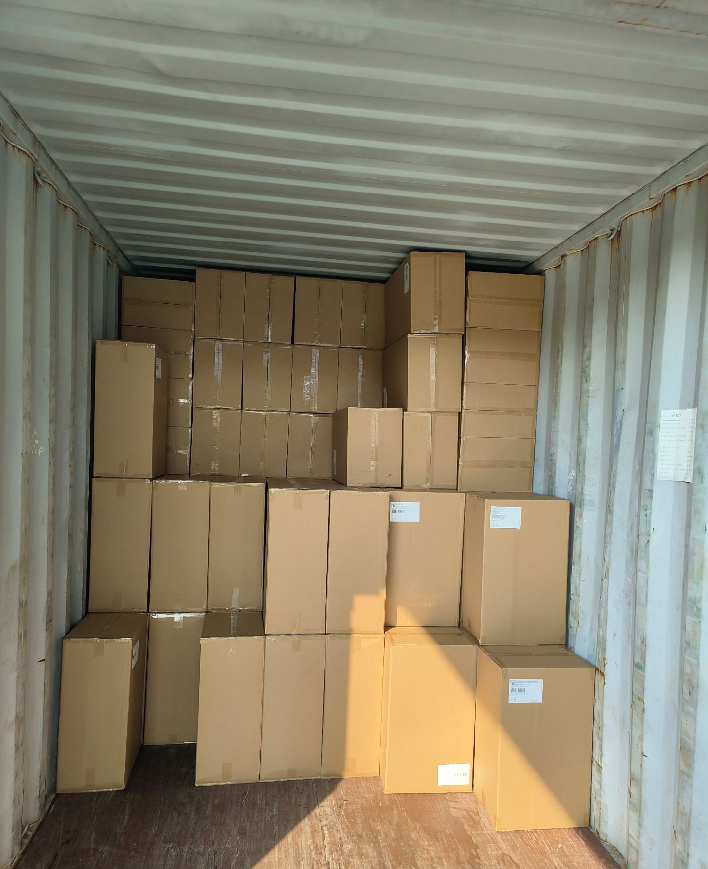 Mixed SKU cartons loaded inside an export container